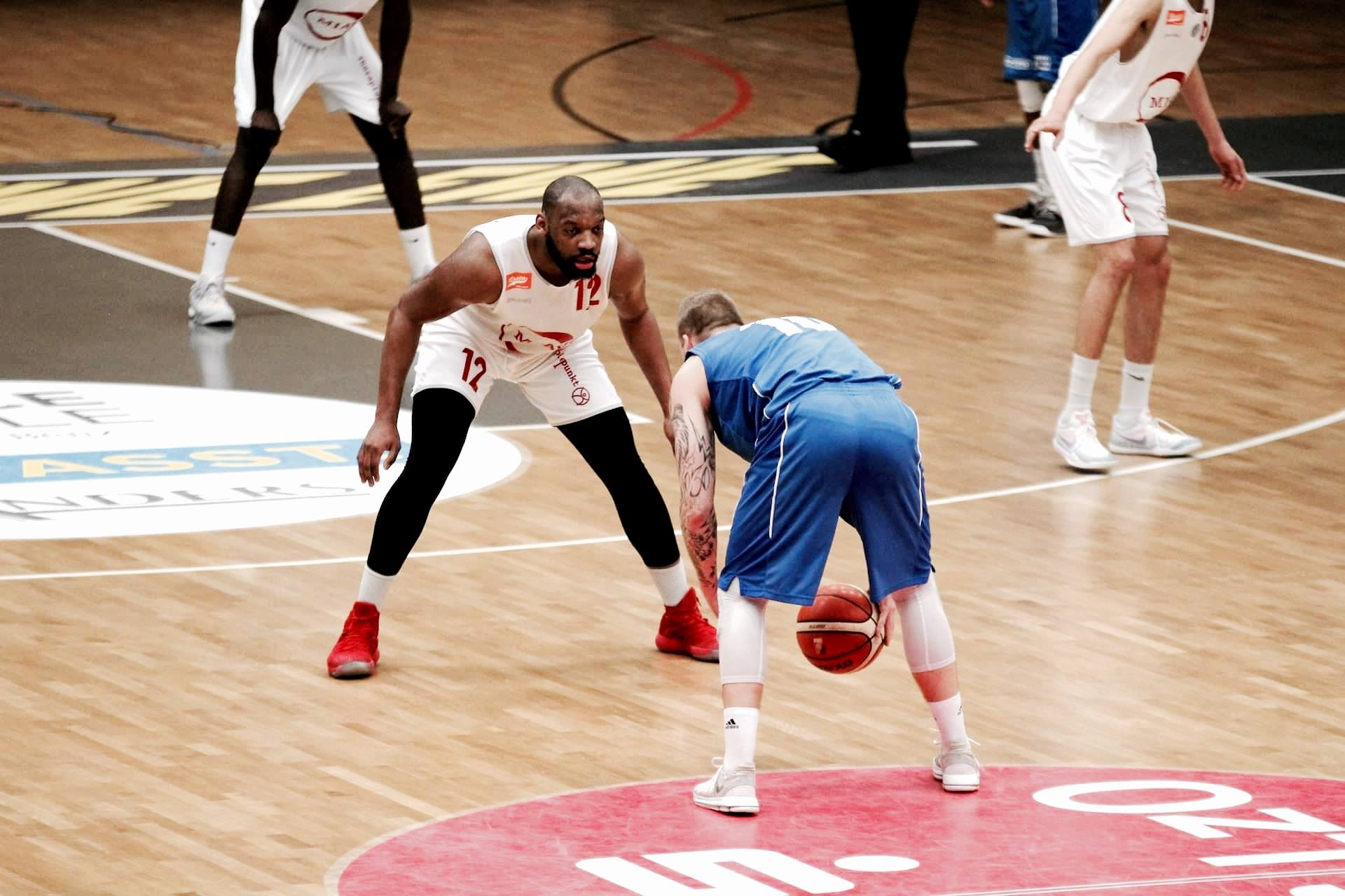 Coach Kaimyn playing defense during professional game